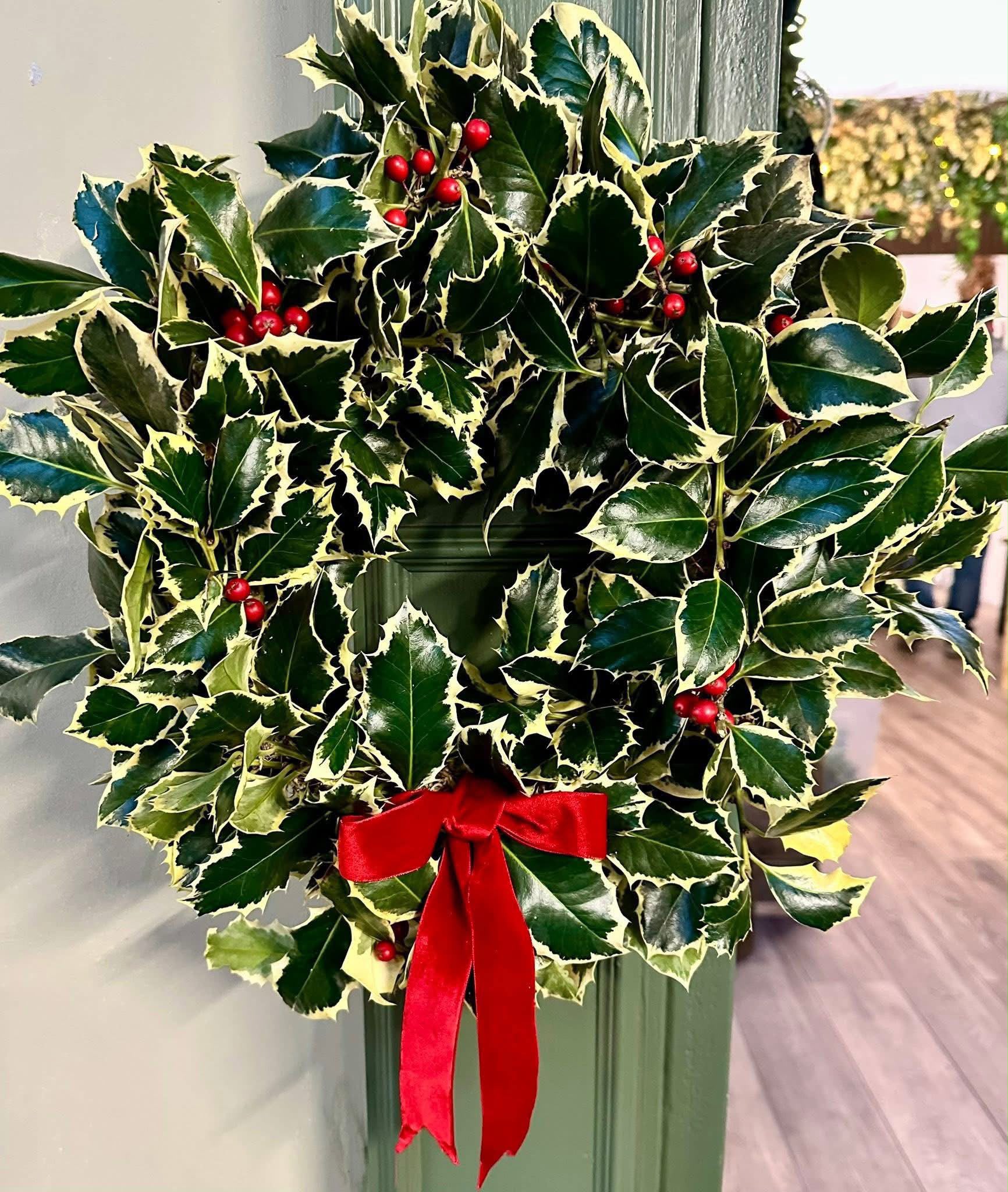 Seasonal Christmas floral arrangement by Willow and Moss