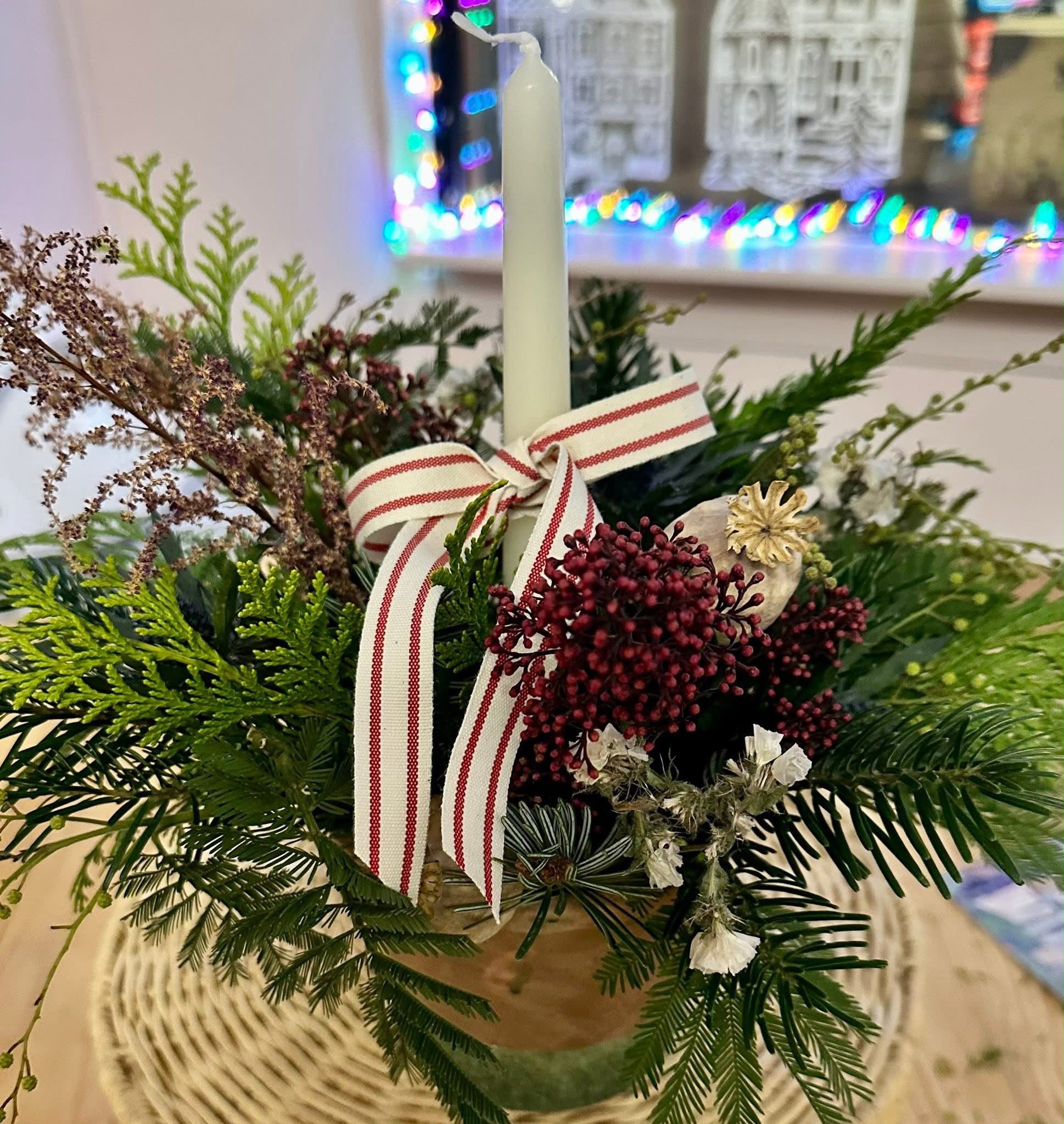 Hand-tied Christmas arrangement by Willow and Moss