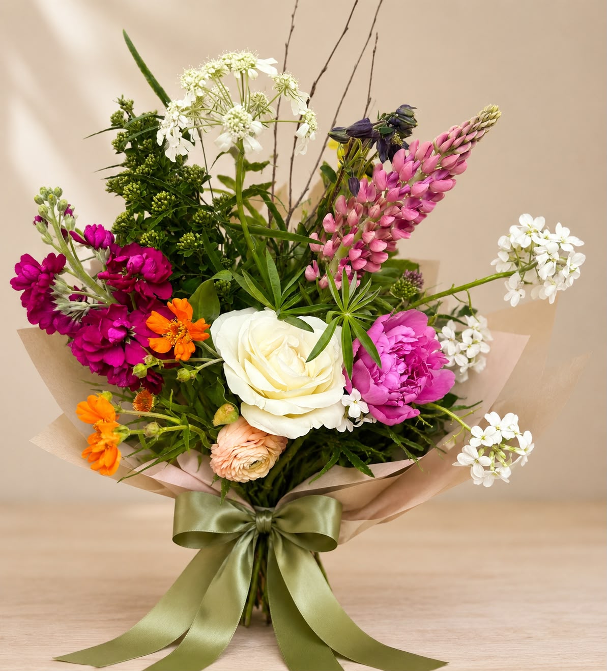 Hand-tied bouquet by Willow and Moss